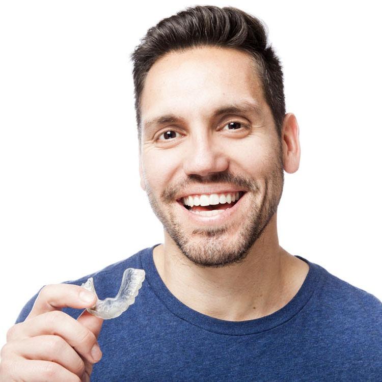 man with clear aligner